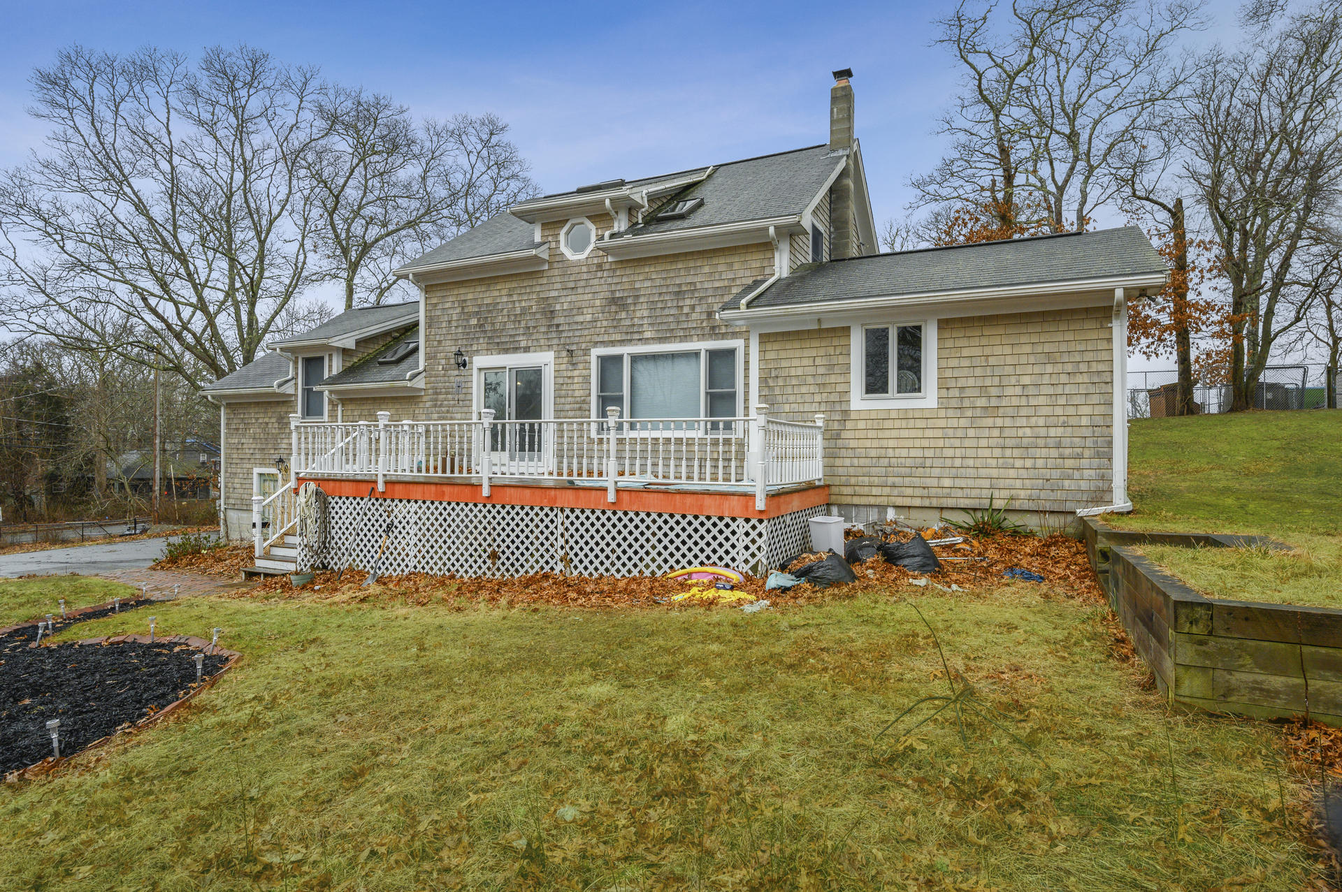 8 Indian Neck Road Wareham, MA 02571 - Photo 3 of 18 front view of house with a yard