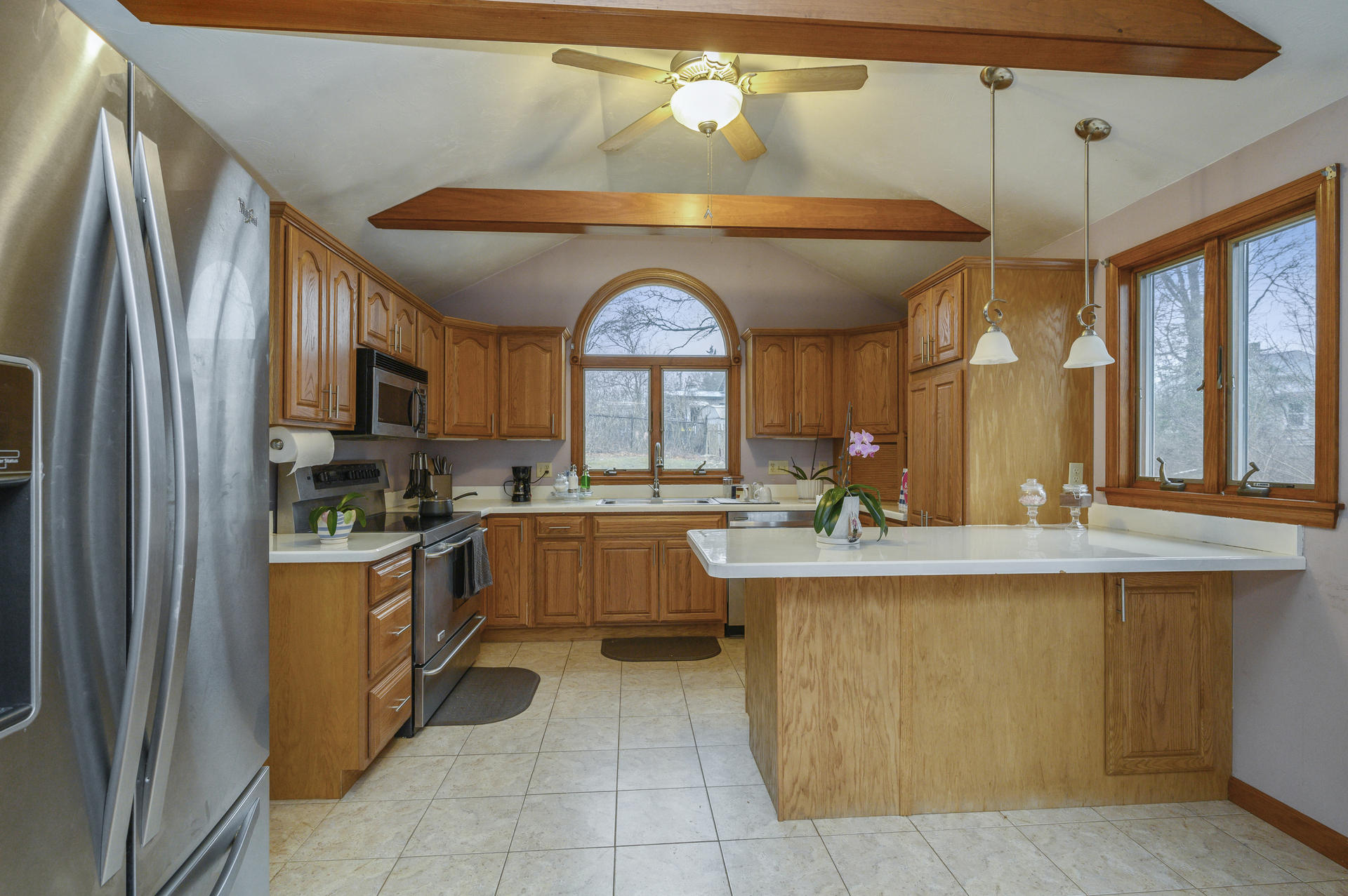 8 Indian Neck Road Wareham, MA 02571 - Photo 7 of 18 a large kitchen with a large counter top space and stainless steel appliances