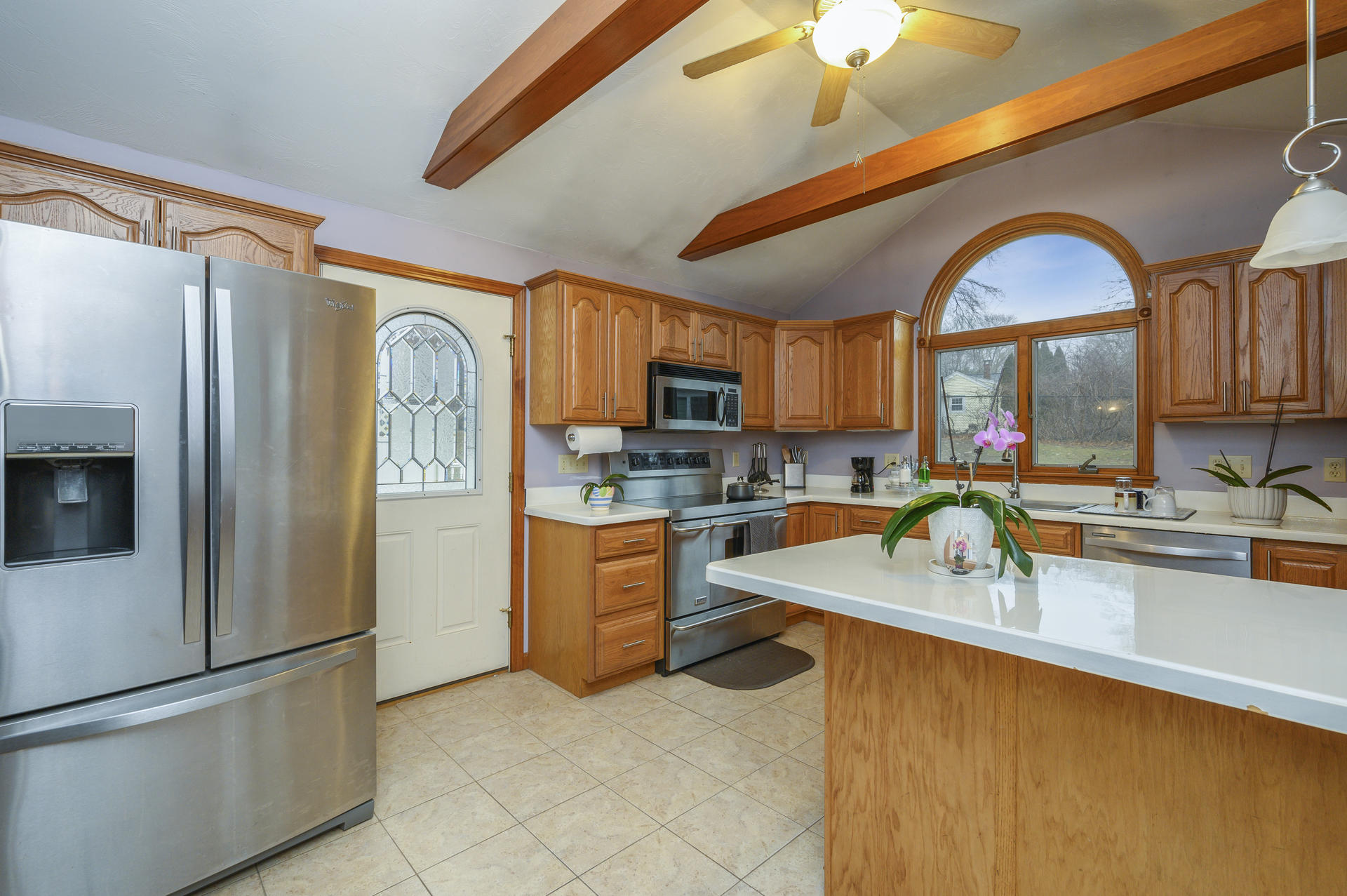 8 Indian Neck Road Wareham, MA 02571 - Photo 8 of 18 a kitchen with stainless steel appliances granite countertop a refrigerator a stove top oven a sink and dishwasher