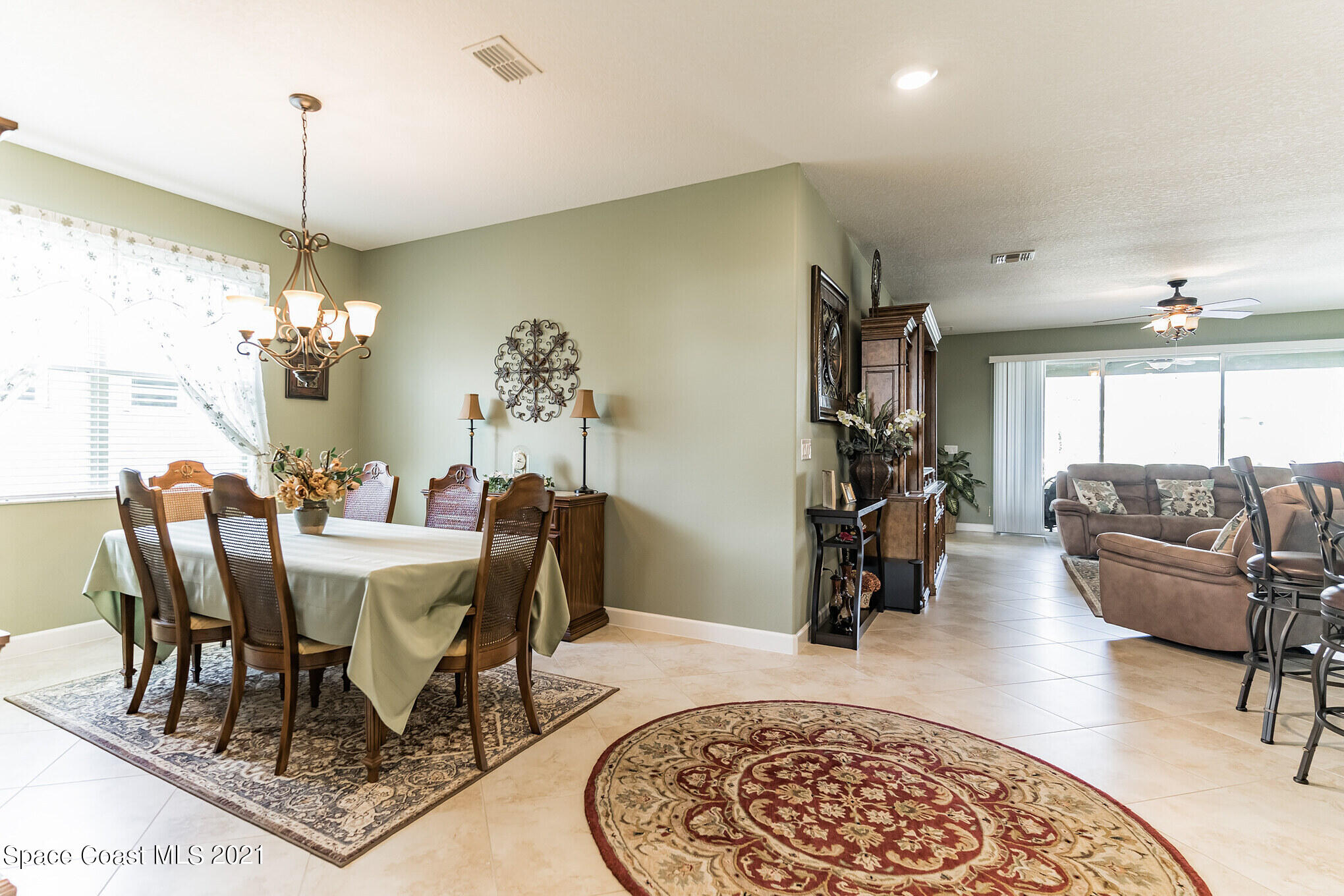 3242 Balboa Place Melbourne, FL 32940 - Photo 11 of 34 a view of a dining room with furniture