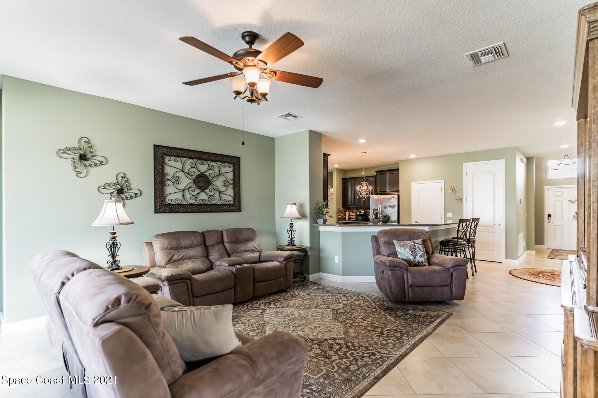 3242 Balboa Place Melbourne, FL 32940 - Photo 13 of 34 a living room with furniture