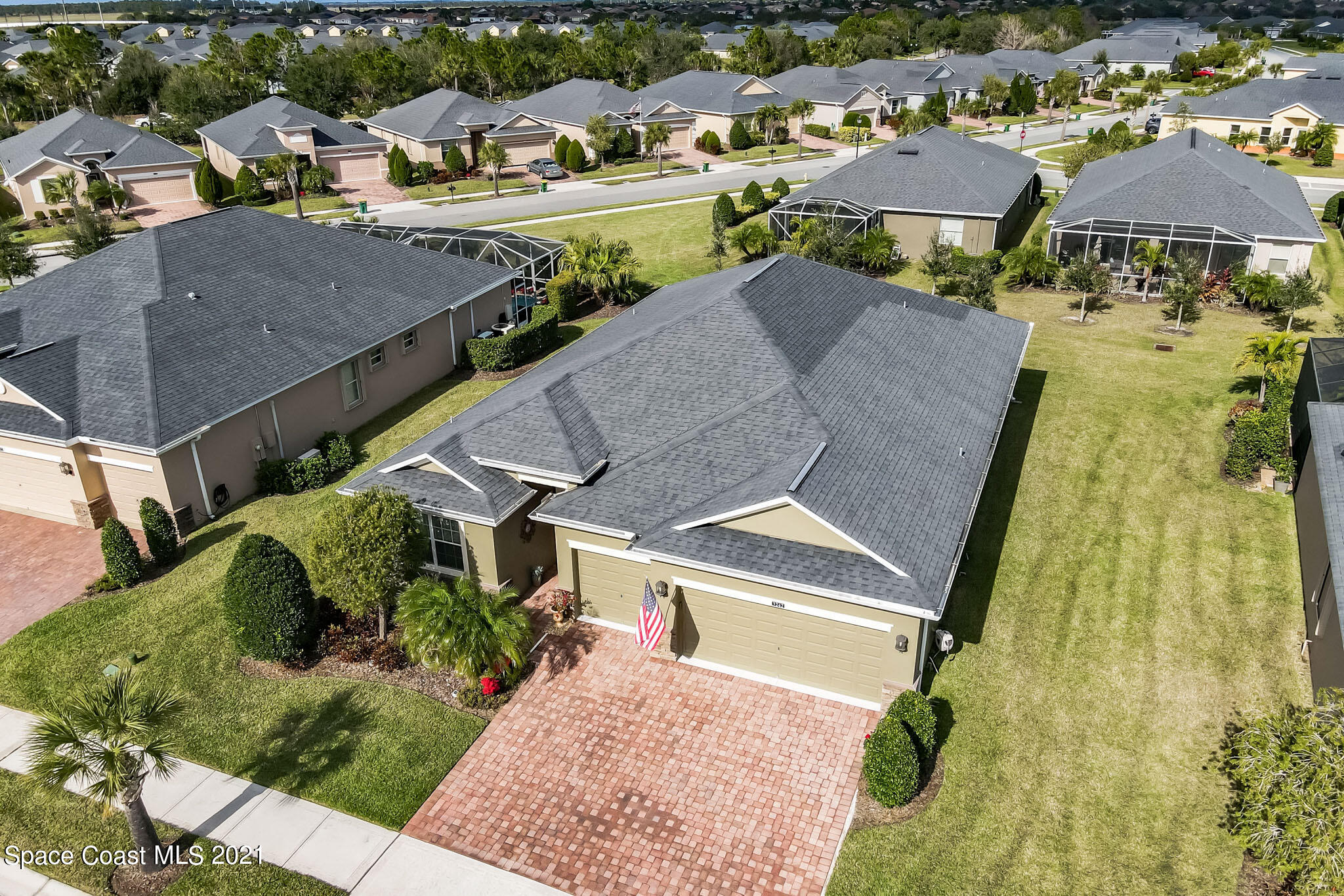 3242 Balboa Place Melbourne, FL 32940 - Photo 31 of 34 an aerial view of a house with a garden