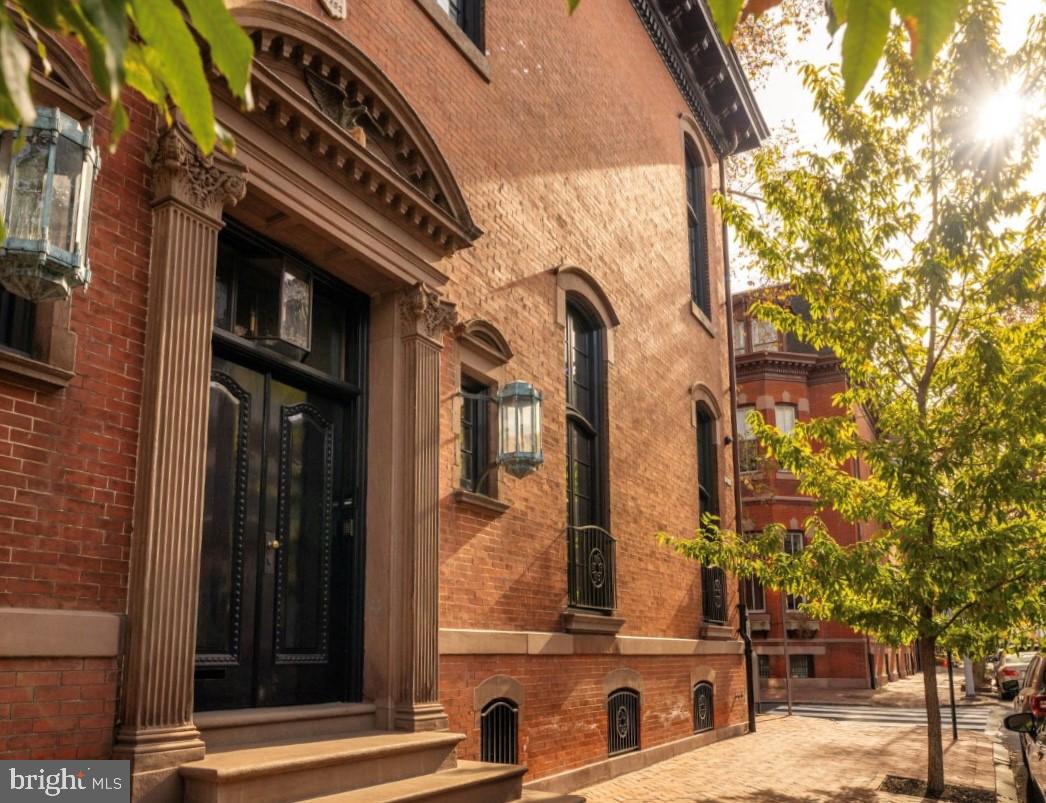 2041 Delancey Street Philadelphia, PA 19103 - Photo 2 of 29 a view of a brick building with many windows