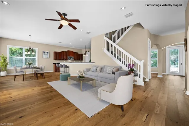 a kitchen that has a sink and a stove in it