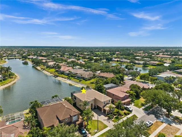 an aerial view of a city with houses