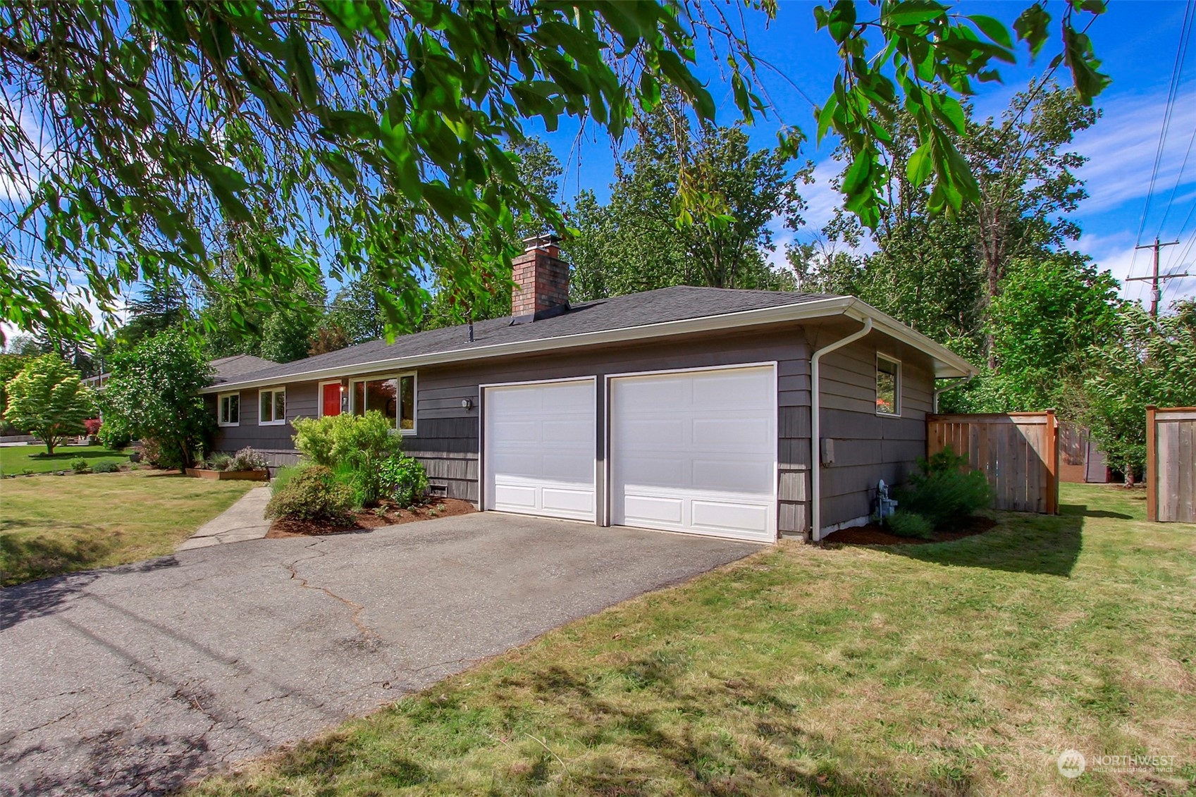 7 232nd Place Southwest Bothell, WA 98021 - Photo 1 of 30 a front view of a house with a yard and potted plants