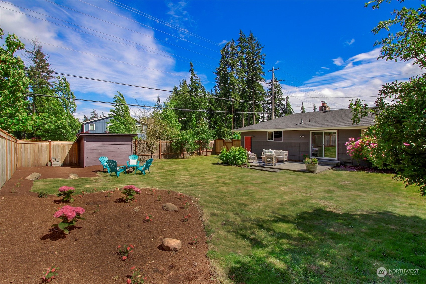 7 232nd Place Southwest Bothell, WA 98021 - Photo 23 of 30 a front view of a house with a yard