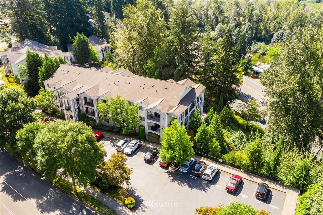 10709 Valley View Road, Unit A301 Bothell, WA 98011 - Photo 2 of 26 an aerial view of a house with yard