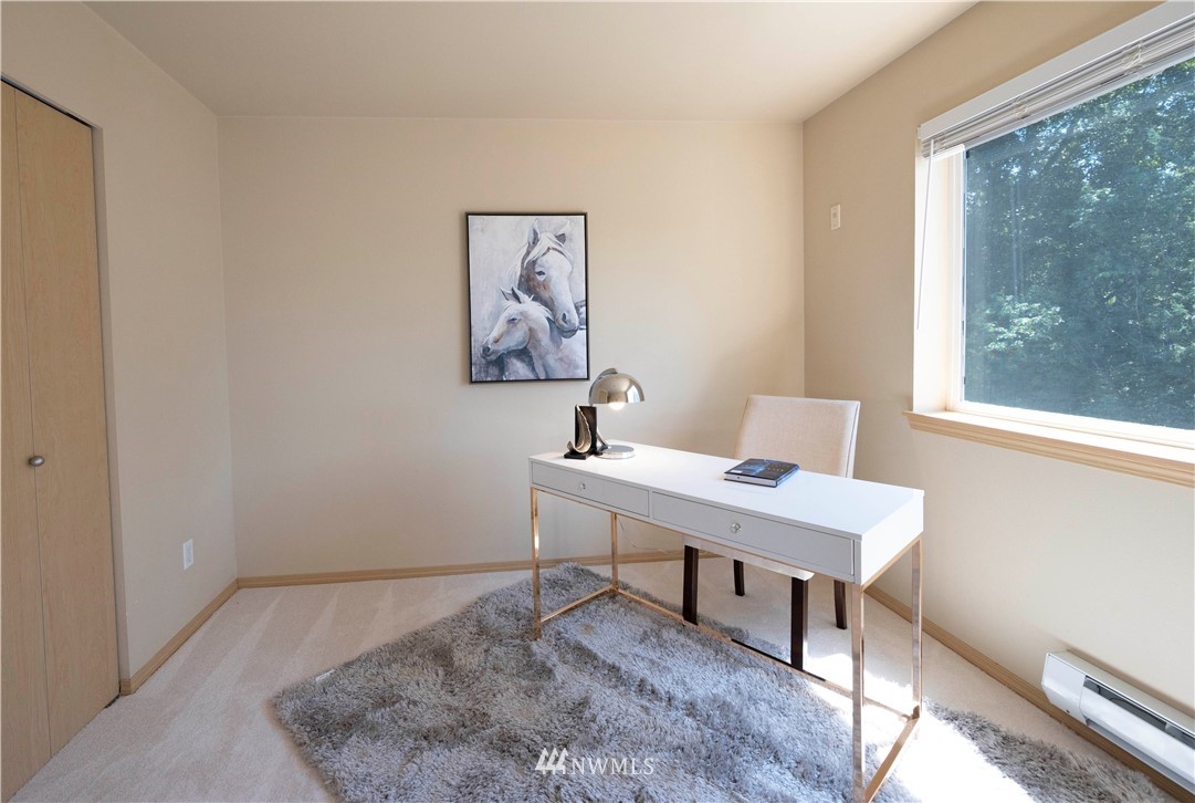 10709 Valley View Road, Unit A301 Bothell, WA 98011 - Photo 18 of 26 a workspace with furniture and window