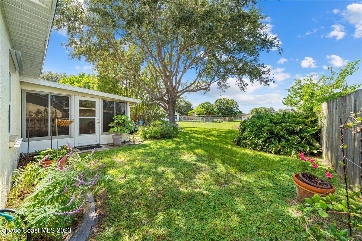 1810 West Shores Road Melbourne, FL 32935 - Photo 21 of 25 backyard