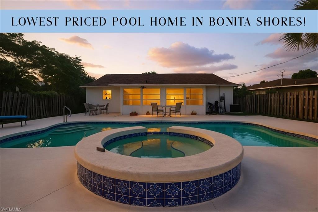 55 2nd Street Bonita Springs, FL 34134 - Photo 1 of 25 a view of swimming pool with outdoor seating