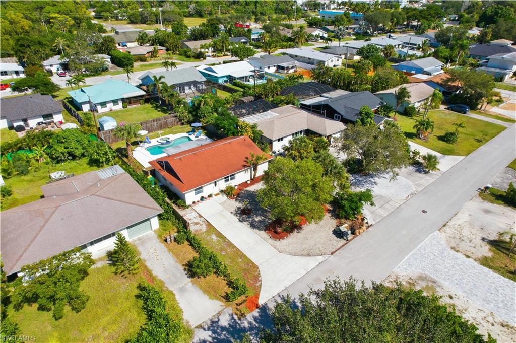 55 2nd Street Bonita Springs, FL 34134 - Photo 24 of 25 an aerial view of residential houses with outdoor space