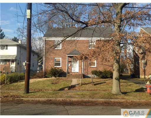 824 2nd Street, Unit 1 Dunellen, NJ 08812 - Photo 3 of 11 a view of a large house with a yard