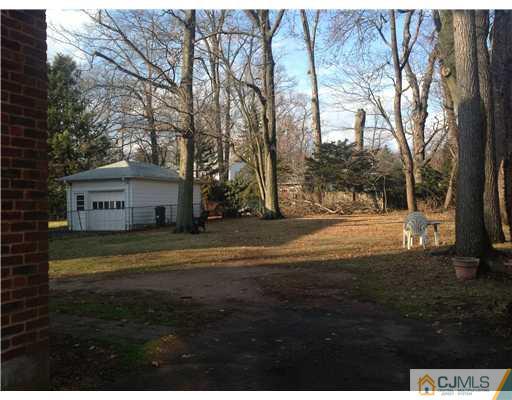 824 2nd Street, Unit 1 Dunellen, NJ 08812 - Photo 9 of 11 a view of a house with a yard