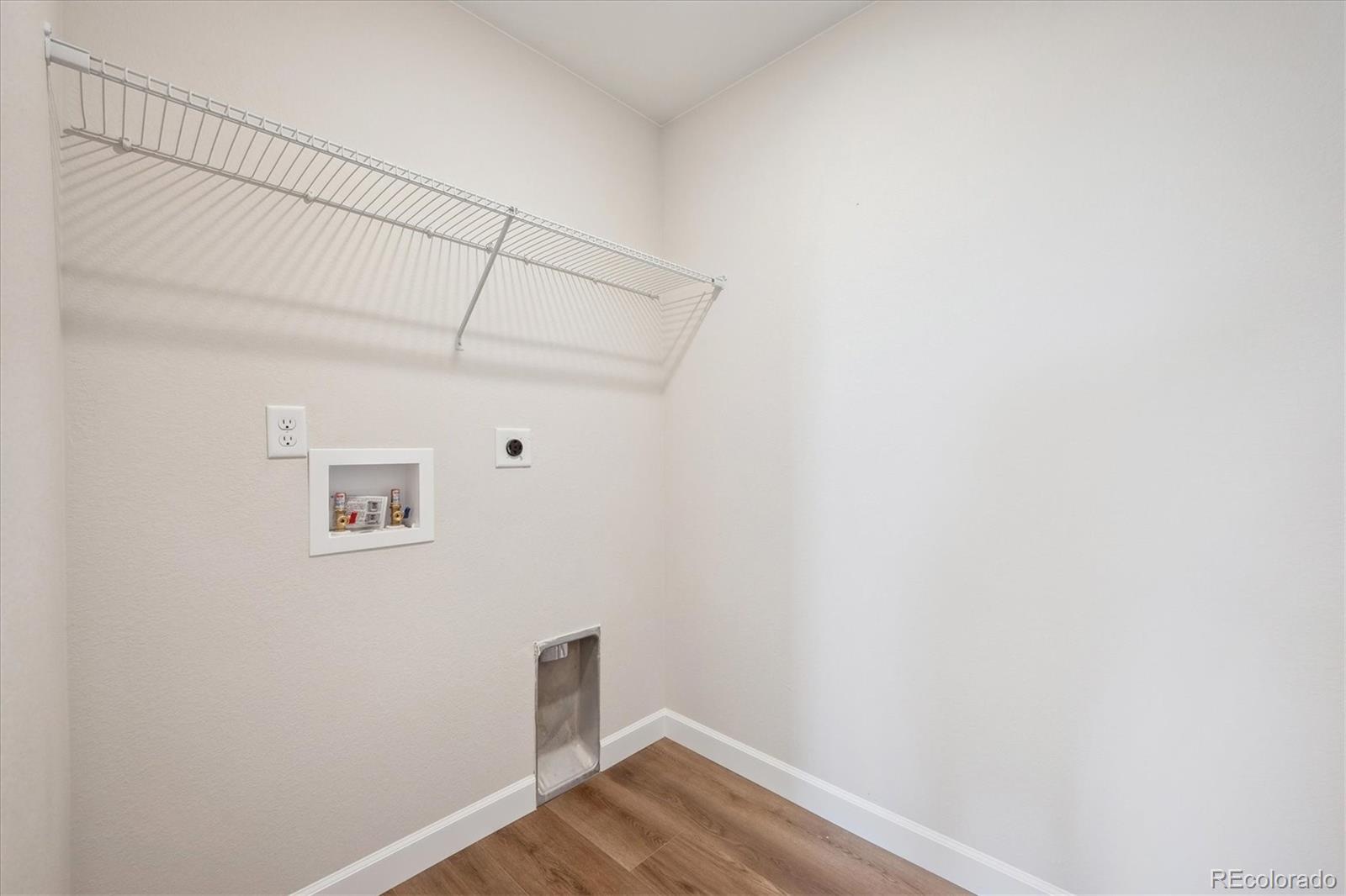 5583 Riverbend Avenue Firestone, CO 80504 - Photo 17 of 25 a view of small space with wooden floor