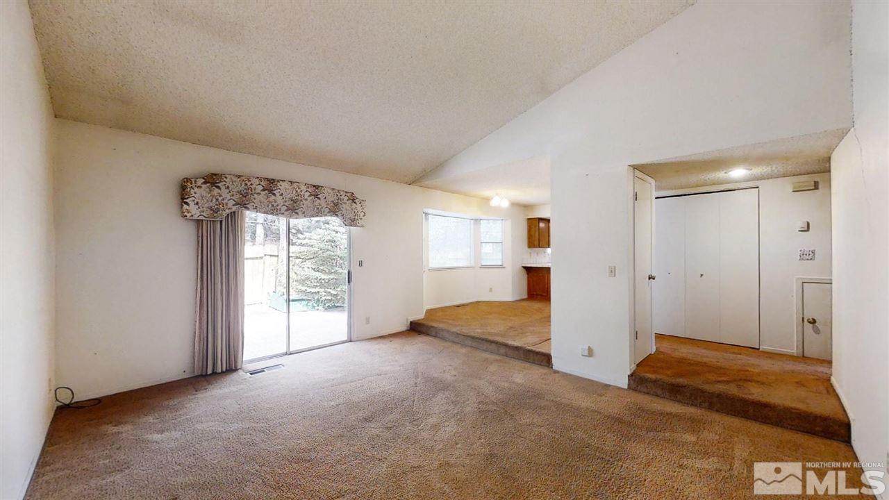 1850 Peavine Road, Unit DRIVE Reno, NV 89503 - Photo 8 of 27 a view of livingroom with hardwood floor and a ceiling fan