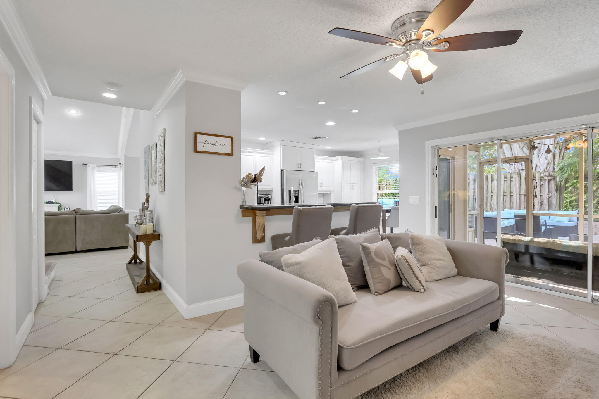 7424 Ashley Shores Circle Lake Worth, FL 33467 - Photo 11 of 33 a living room with furniture and a flat screen tv
