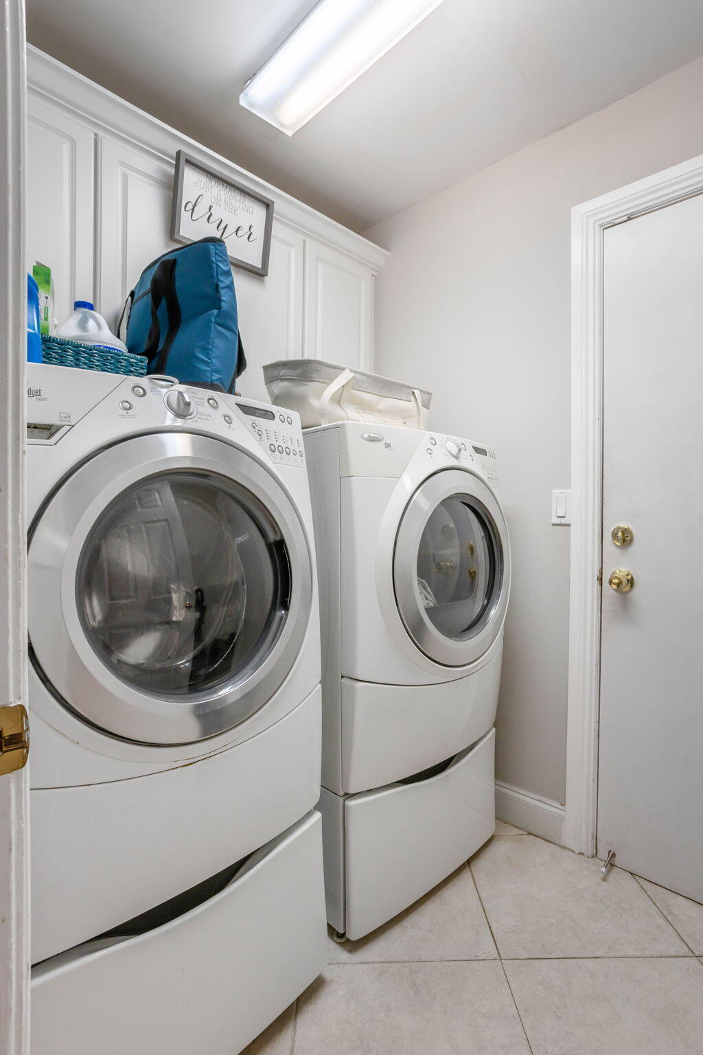 7424 Ashley Shores Circle Lake Worth, FL 33467 - Photo 17 of 33 a utility room with dryer and washer