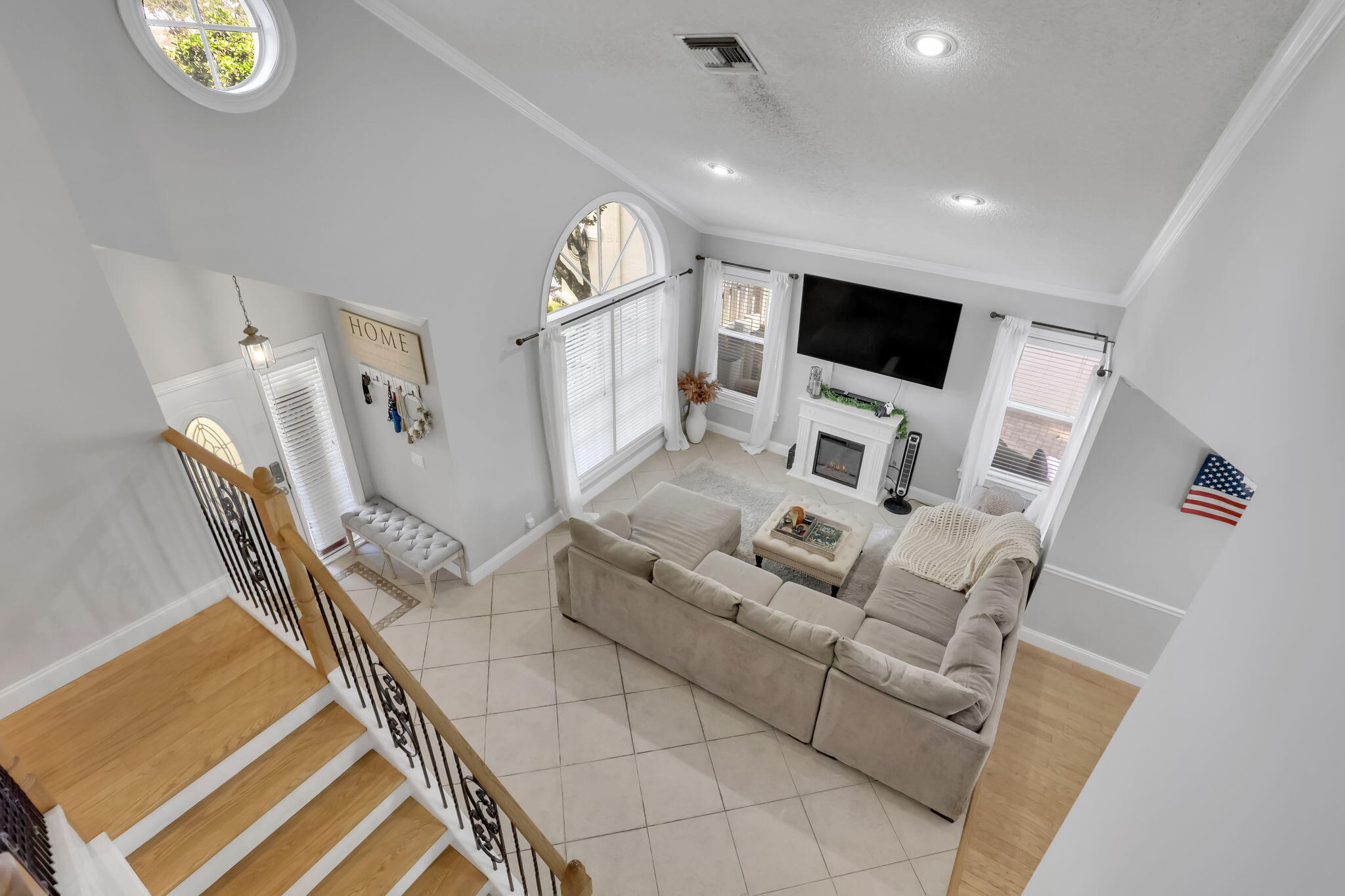 7424 Ashley Shores Circle Lake Worth, FL 33467 - Photo 18 of 33 a living room with furniture and a flat screen tv