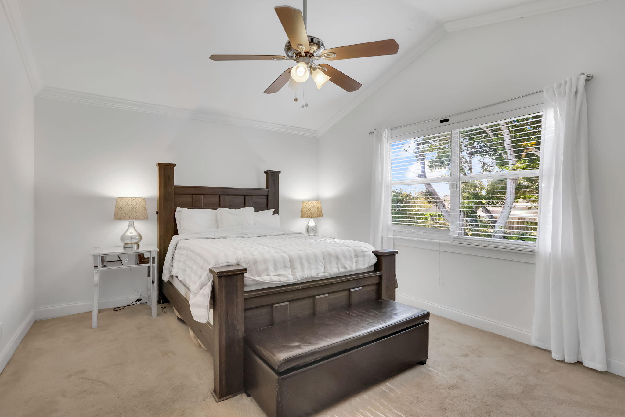 7424 Ashley Shores Circle Lake Worth, FL 33467 - Photo 19 of 33 a bed room with a bed and a ceiling fan