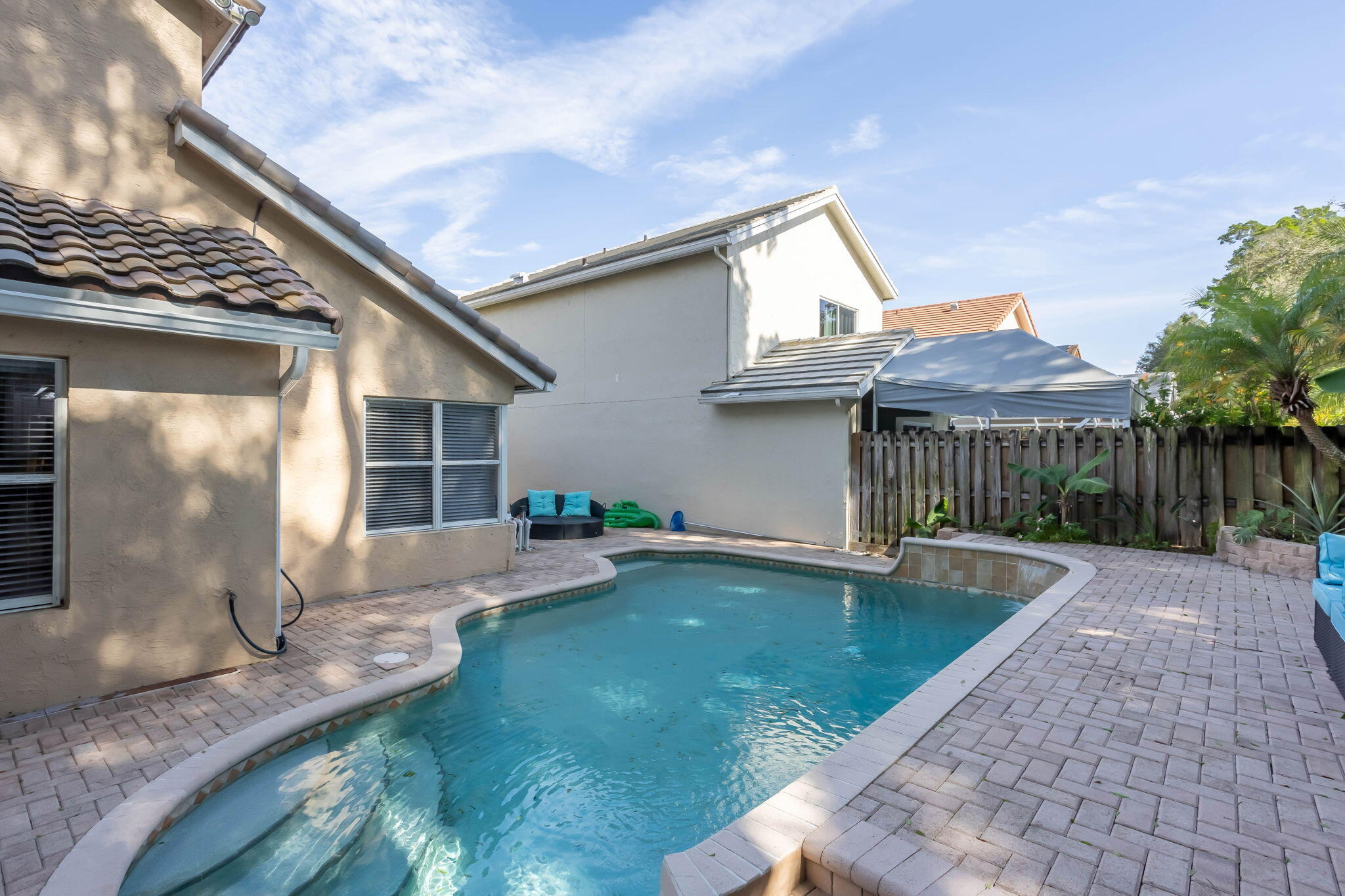 7424 Ashley Shores Circle Lake Worth, FL 33467 - Photo 2 of 33 a view of a house with backyard and sitting area