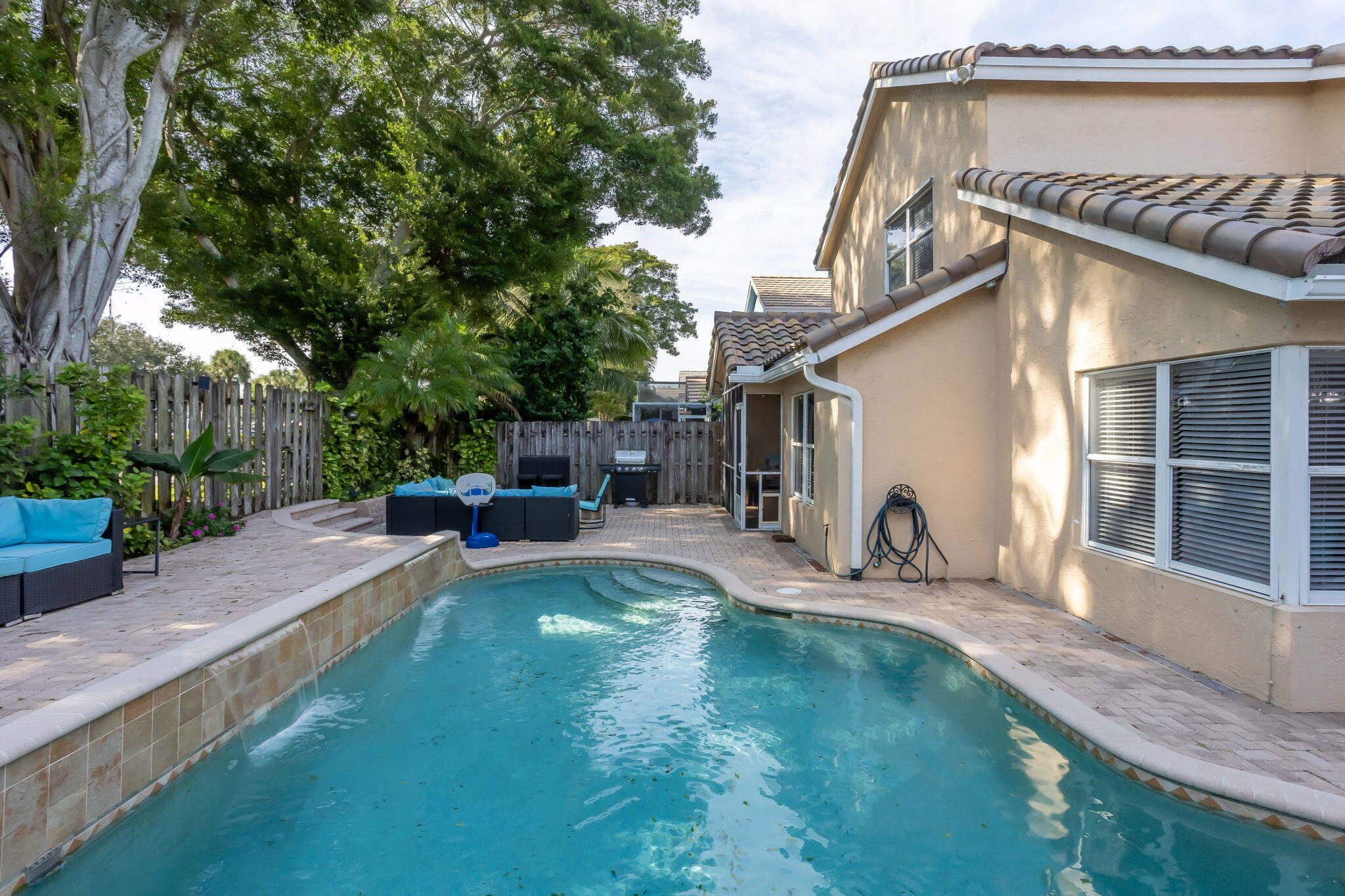 7424 Ashley Shores Circle Lake Worth, FL 33467 - Photo 30 of 33 a view of a house with backyard and sitting area