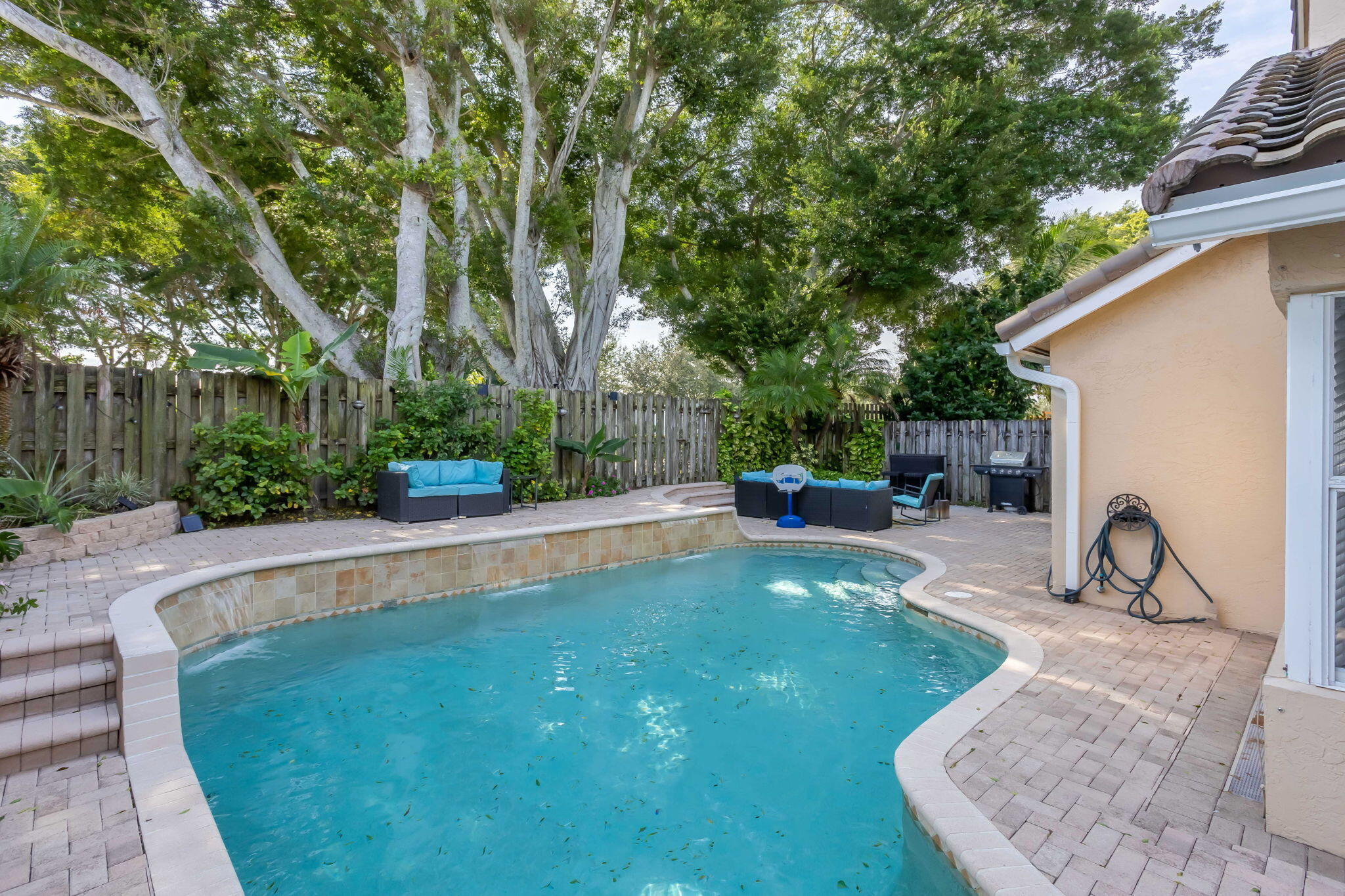 7424 Ashley Shores Circle Lake Worth, FL 33467 - Photo 32 of 33 a view of a swimming pool with a patio