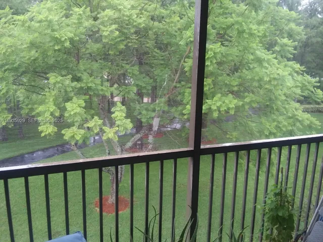 a view of a balcony with outdoor space