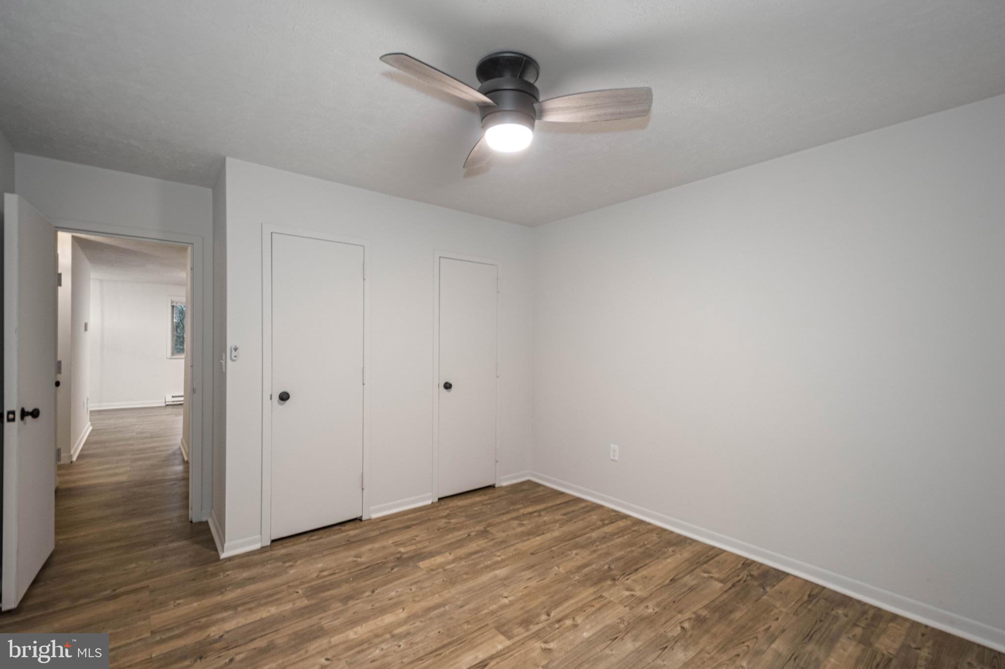 1724 Mosser Road, Unit 1 McHenry, MD 21541 - Photo 13 of 24 a view of an empty room and wooden floor