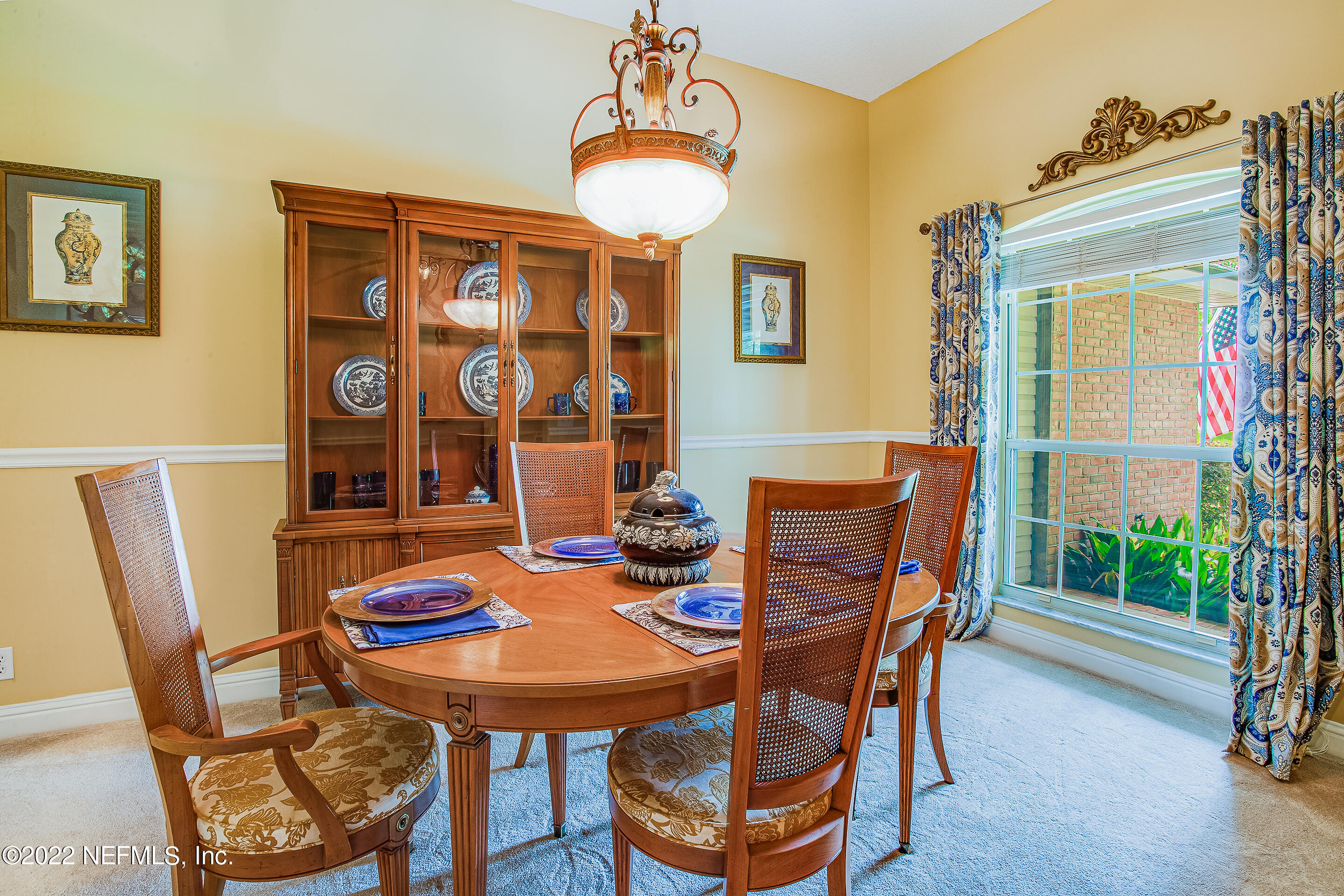 55525 Deer Run Road Callahan, FL 32011 - Photo 12 of 31 a view of a dining room with furniture and window