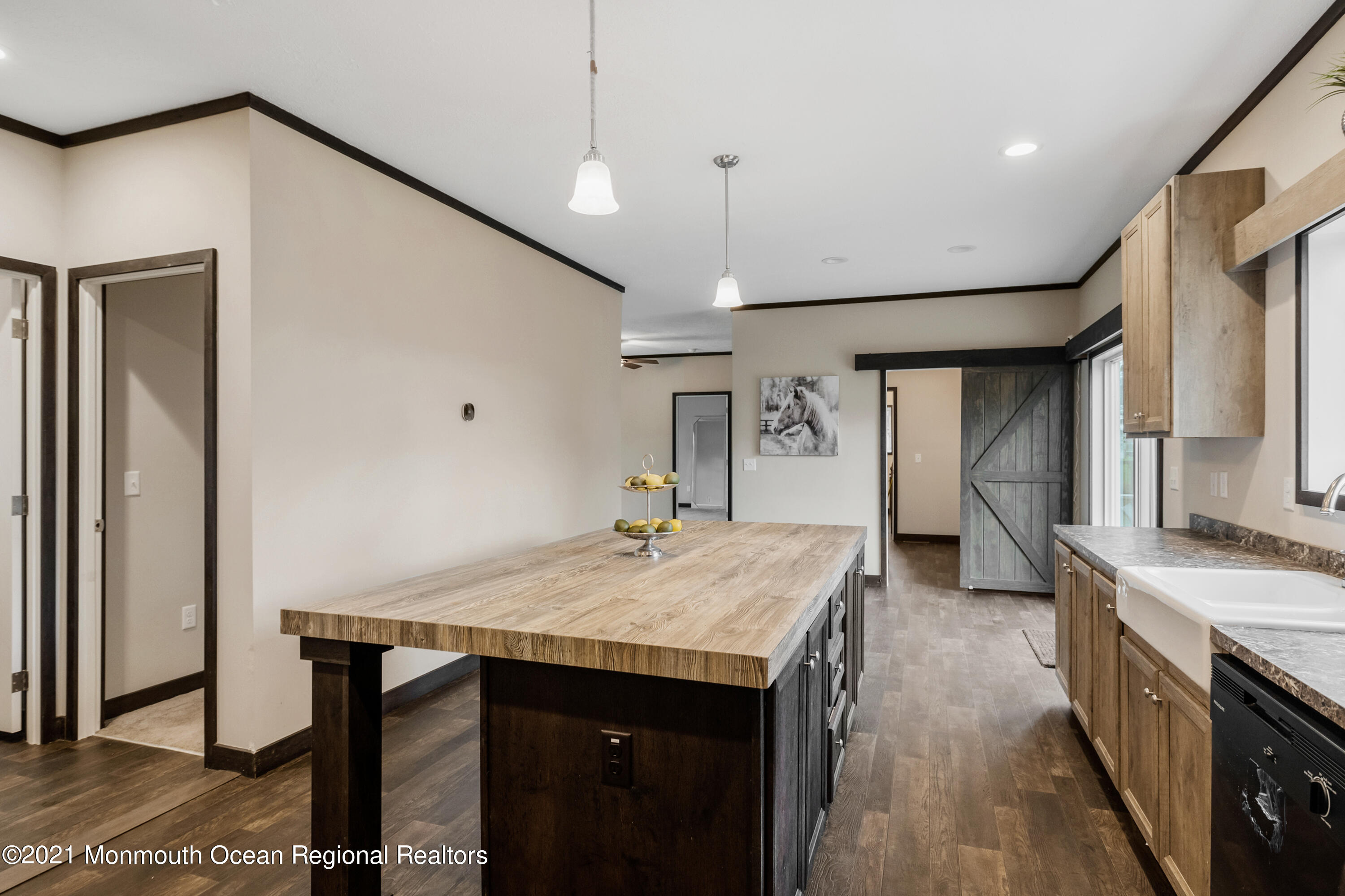 296 Trenton Lakewood Road Cream Ridge, NJ 08514 - Photo 11 of 35 a kitchen with a sink a counter space and stainless steel appliances