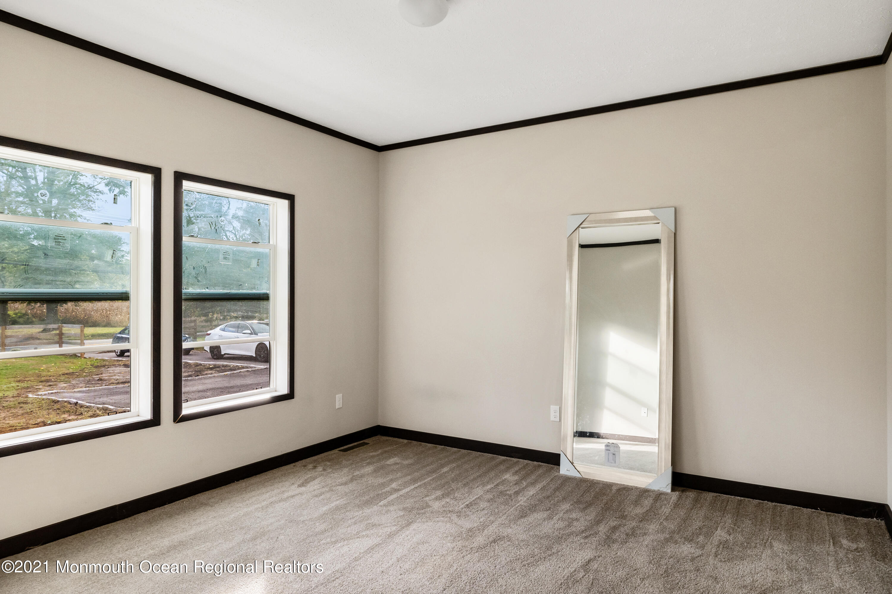 296 Trenton Lakewood Road Cream Ridge, NJ 08514 - Photo 13 of 35 a view of an empty room with window