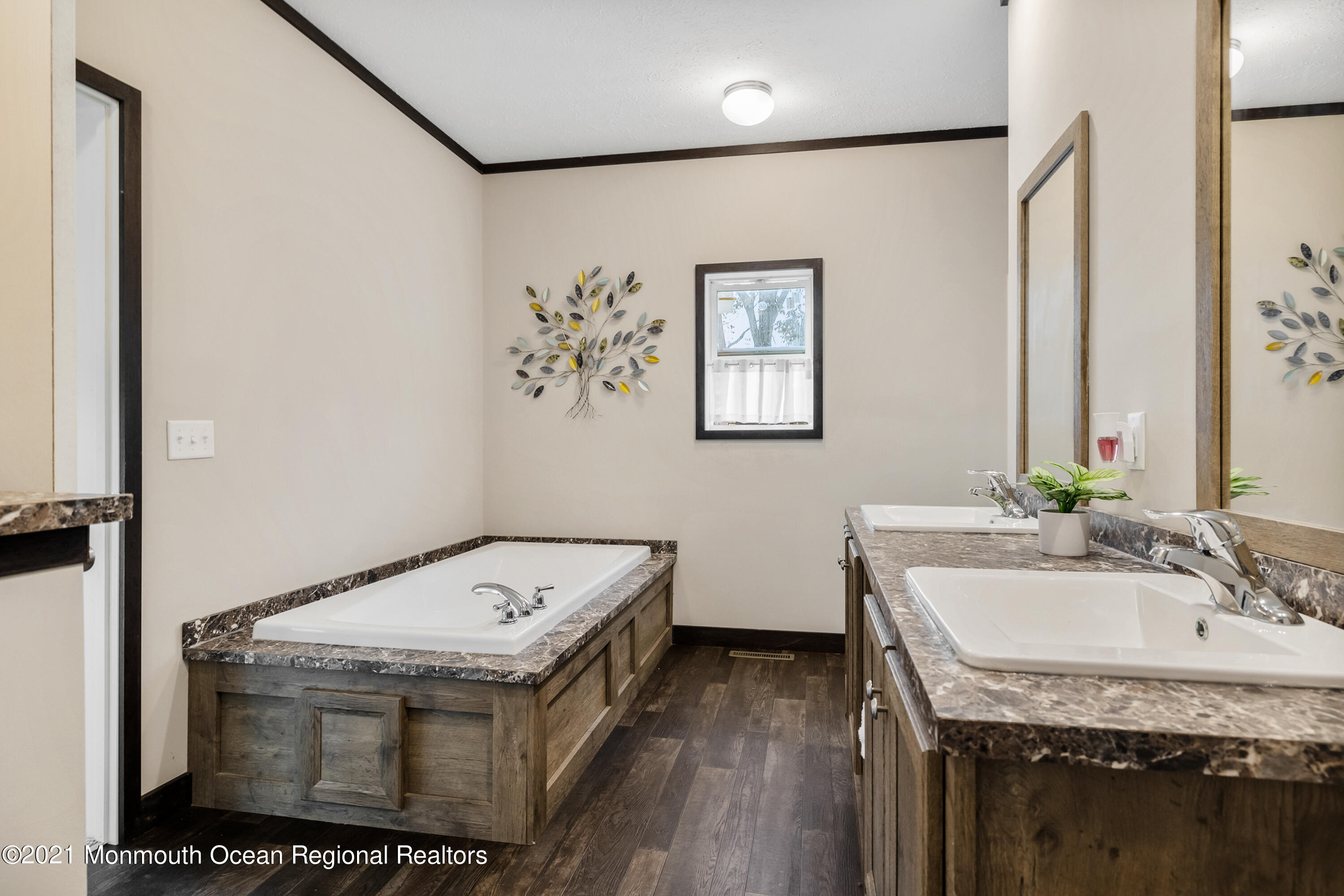 296 Trenton Lakewood Road Cream Ridge, NJ 08514 - Photo 16 of 35 a bathroom with a sink and a mirror