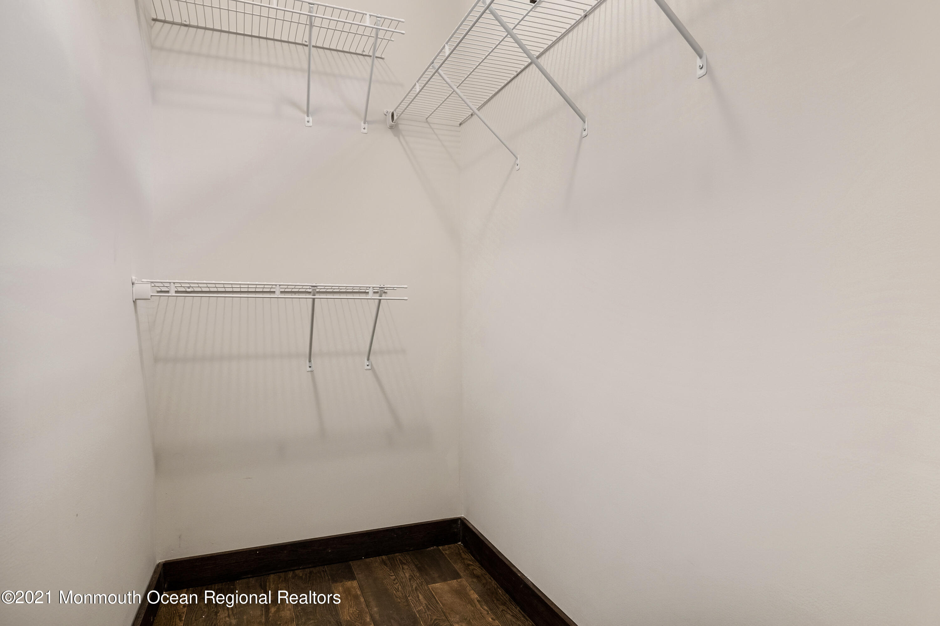 296 Trenton Lakewood Road Cream Ridge, NJ 08514 - Photo 17 of 35 a view of small space with racks on the wall