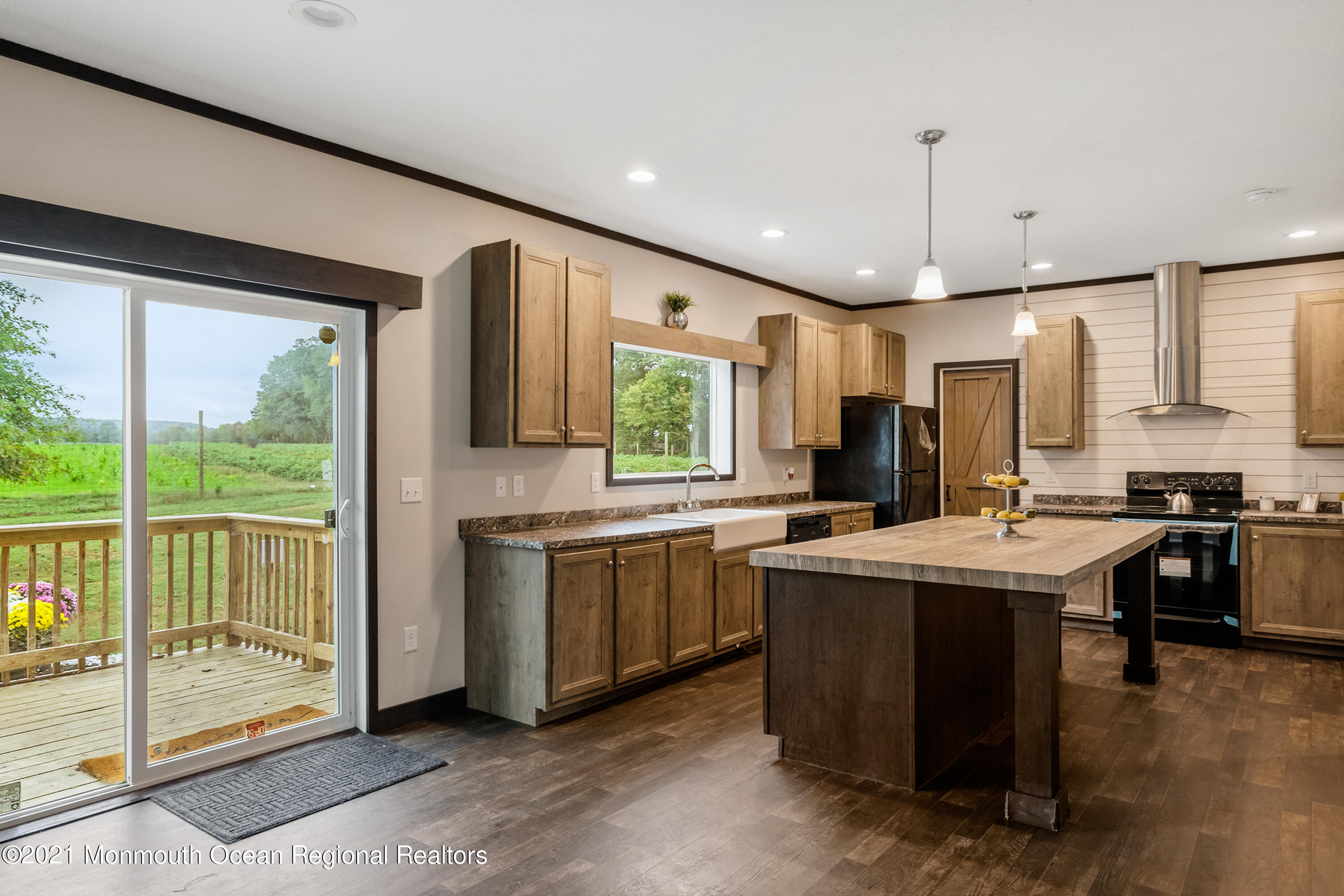 296 Trenton Lakewood Road Cream Ridge, NJ 08514 - Photo 3 of 35 a kitchen with kitchen island granite countertop a stove a sink a oven and a refrigerator
