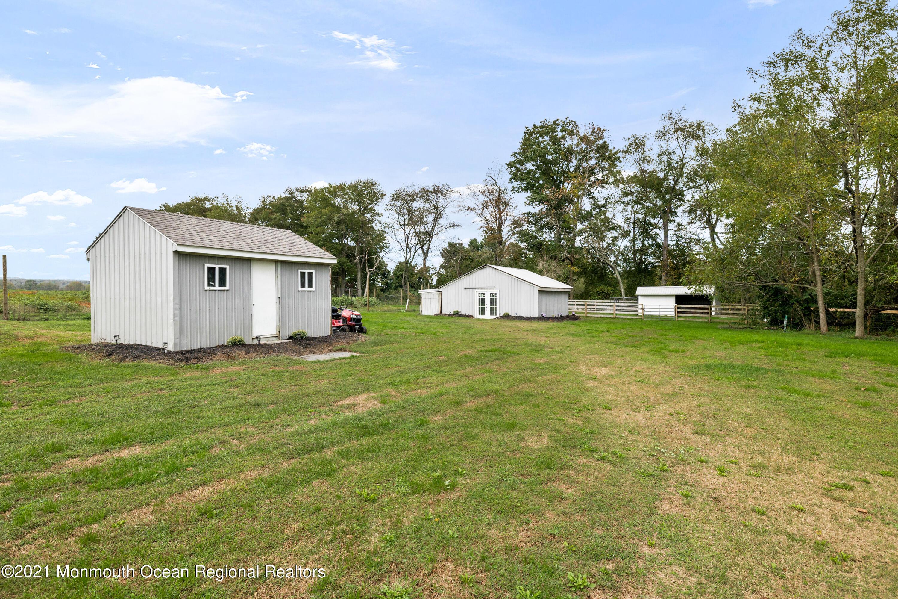 296 Trenton Lakewood Road Cream Ridge, NJ 08514 - Photo 25 of 35 a view of a house with a yard