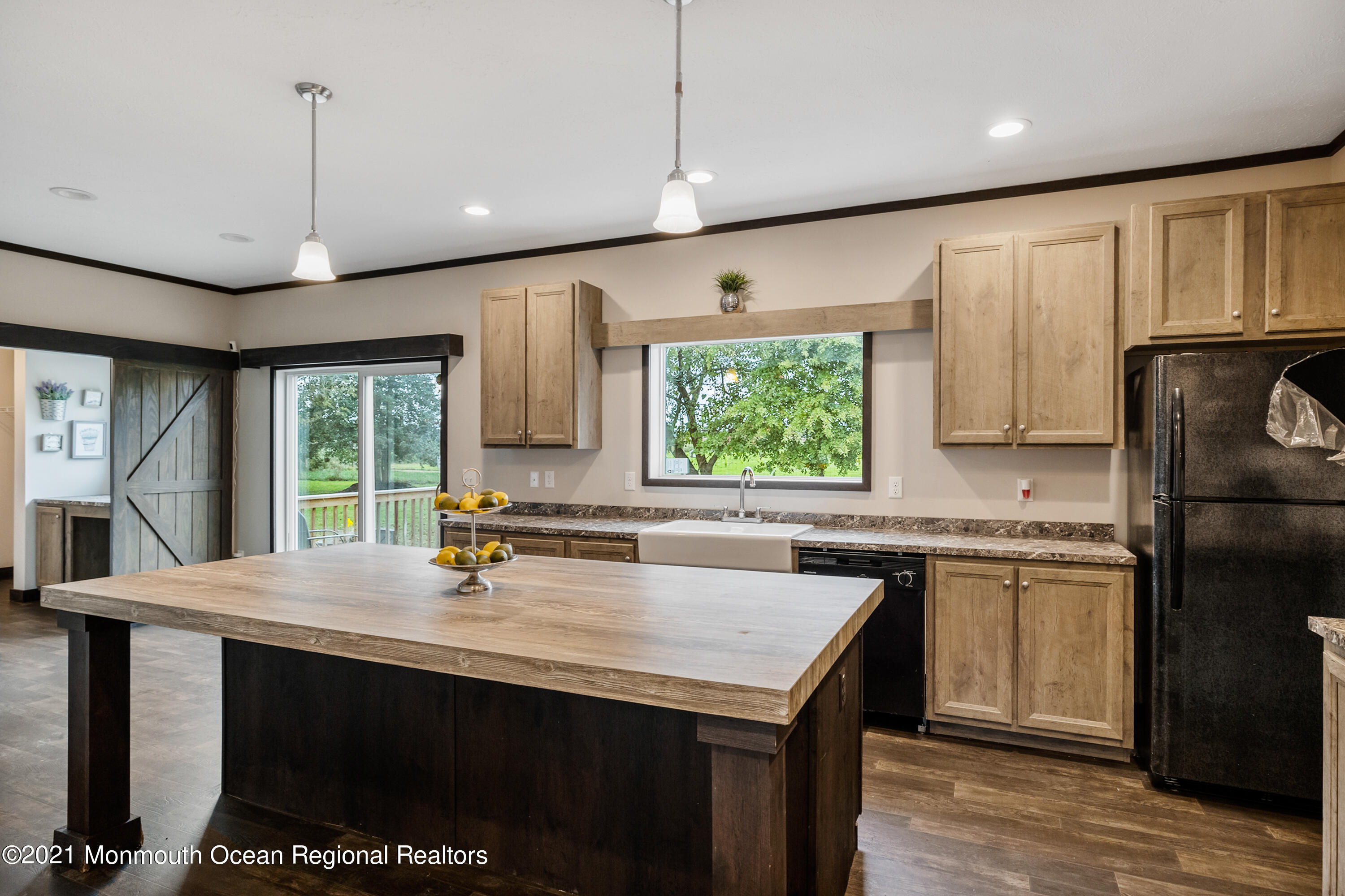 296 Trenton Lakewood Road Cream Ridge, NJ 08514 - Photo 4 of 35 a kitchen with kitchen island a sink stove and refrigerator