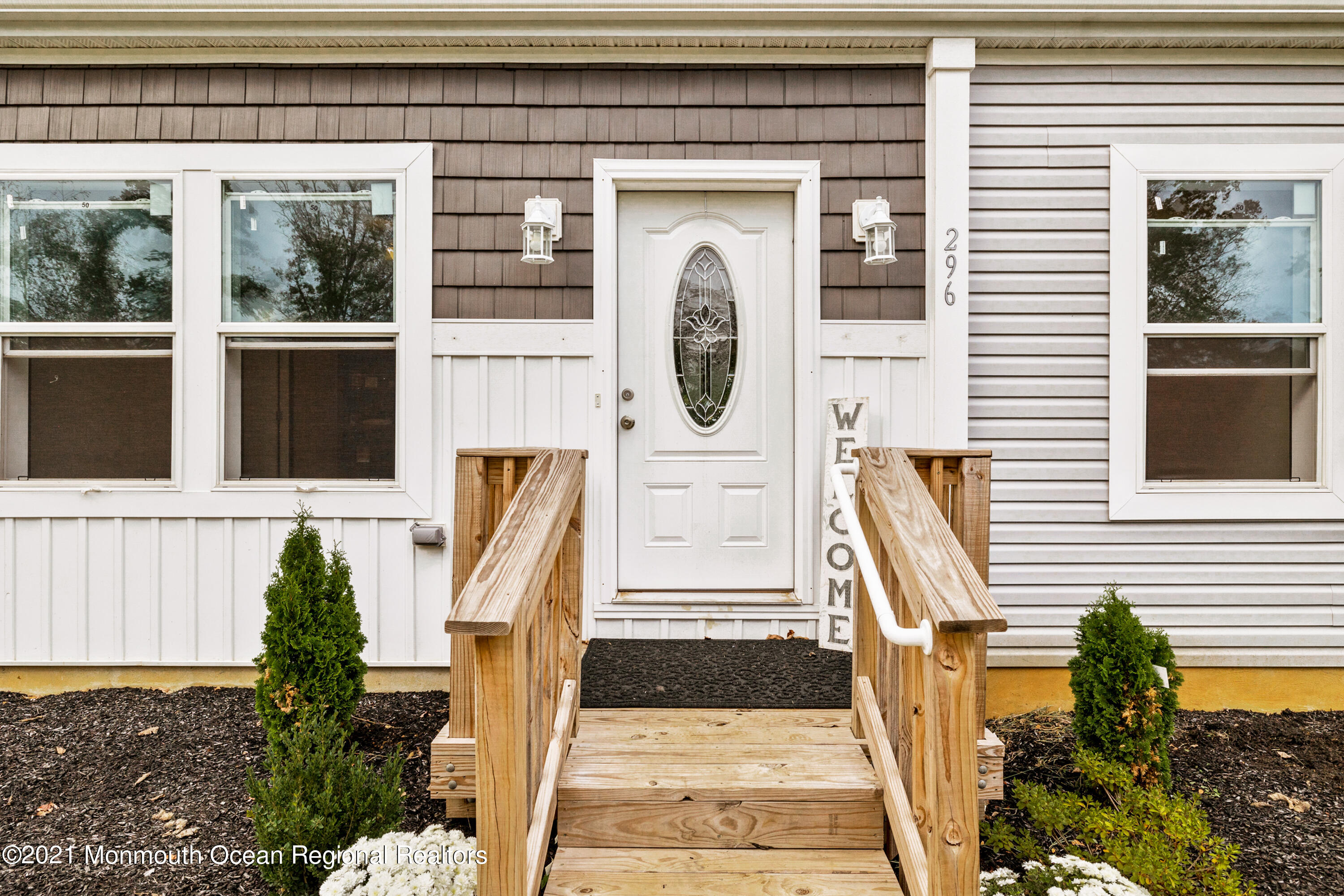 296 Trenton Lakewood Road Cream Ridge, NJ 08514 - Photo 34 of 35 a front view of a house with large windows