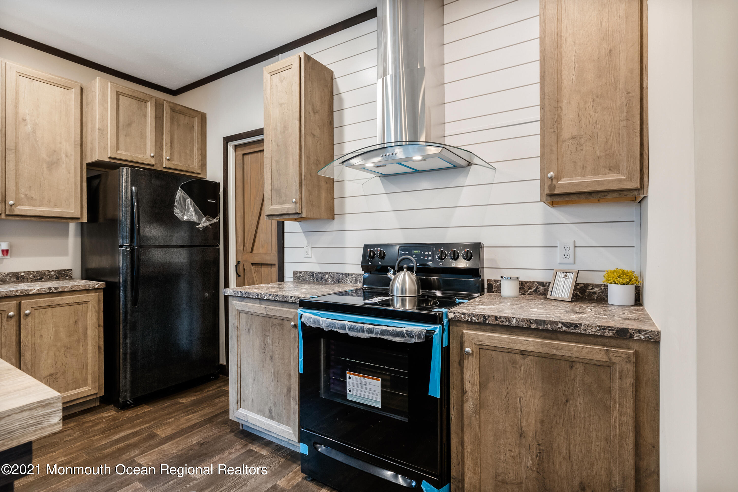 296 Trenton Lakewood Road Cream Ridge, NJ 08514 - Photo 5 of 35 a kitchen with stainless steel appliances granite countertop a stove a refrigerator and a sink
