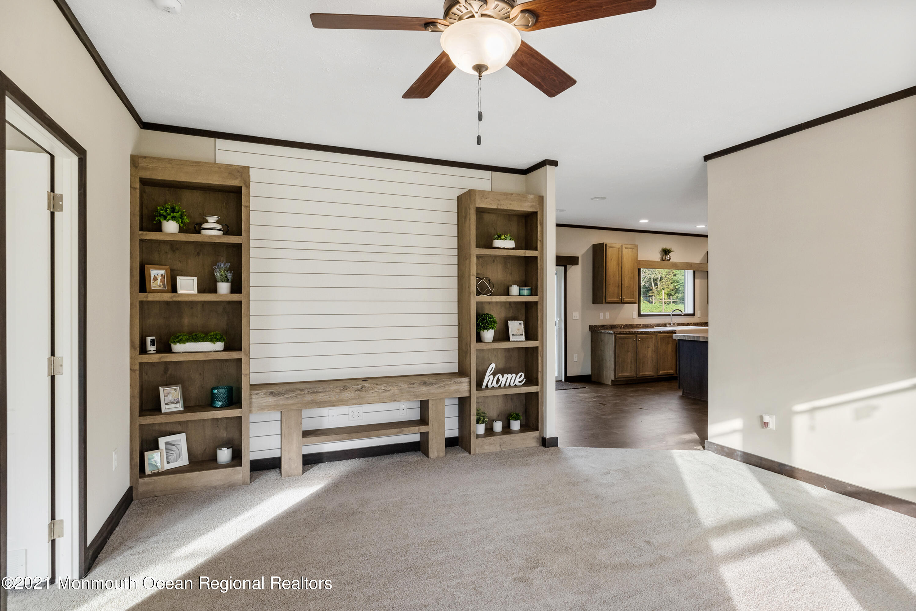 296 Trenton Lakewood Road Cream Ridge, NJ 08514 - Photo 8 of 35 a view of an empty room with window and cabinet