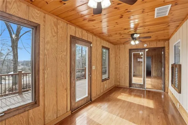 a view of a kitchen with a sink and windows