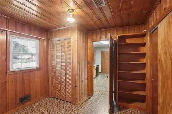 a kitchen with stainless steel appliances granite countertop a sink and a stove