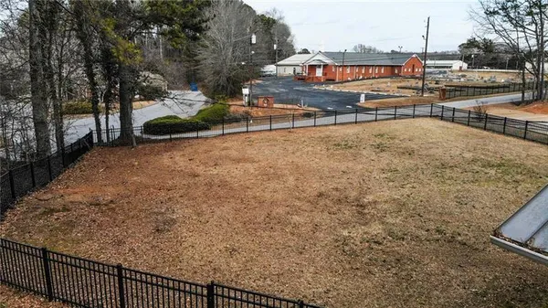 a view of a swimming pool with a lounge chair