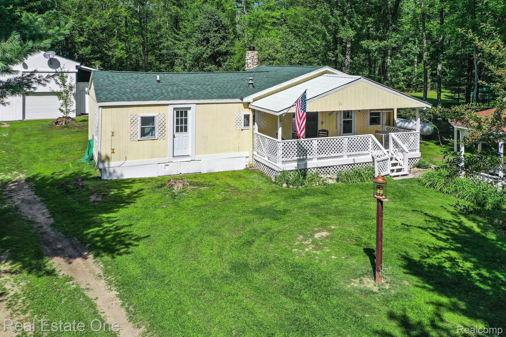 5423 Wilson Road Harrison, MI 48625 - Photo 4 of 35 DJI_0170.jpg