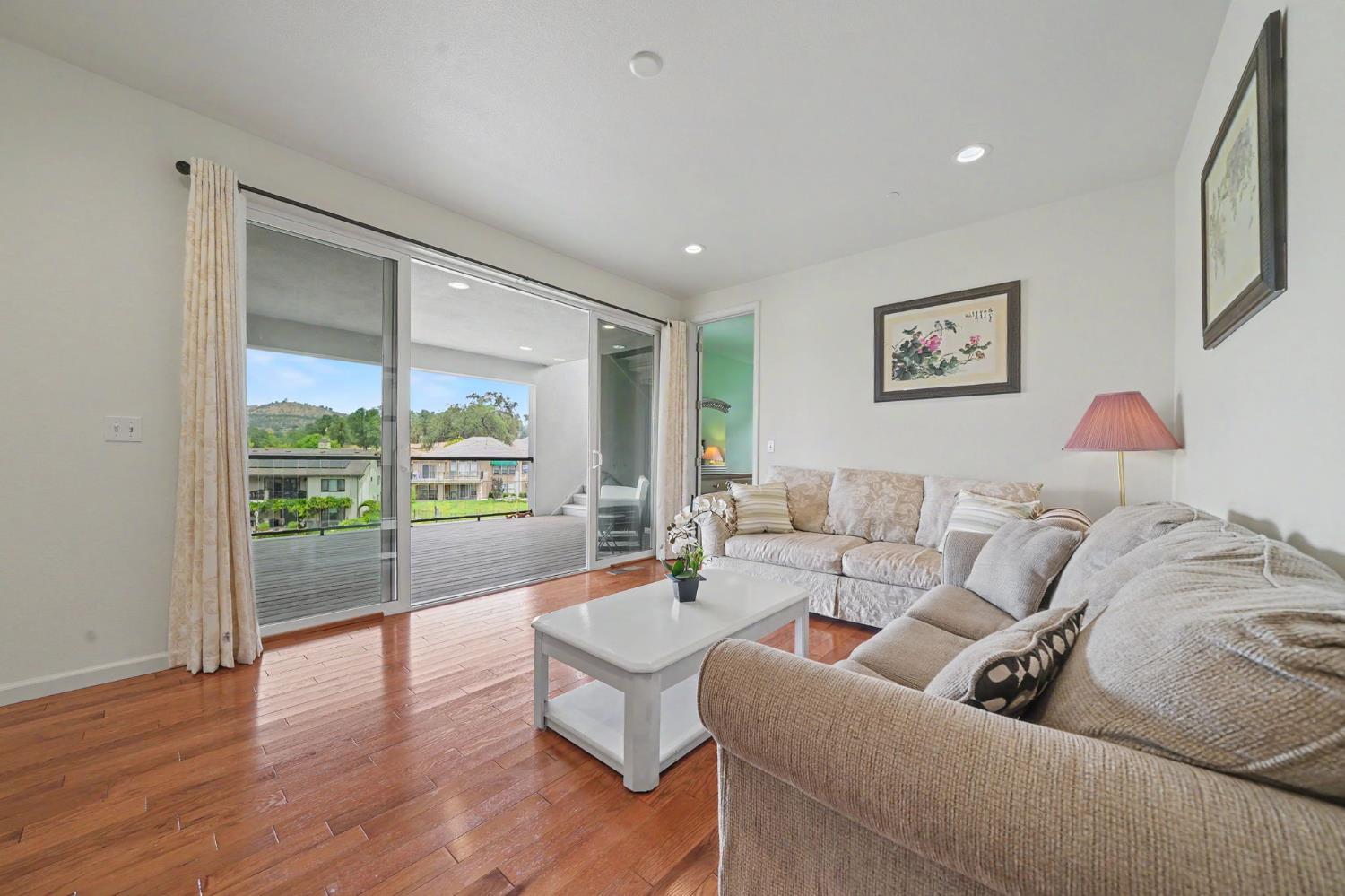 6066 Bluff View Road Copperopolis, CA 95228 - Photo 54 of 96 a living room with furniture and a large window