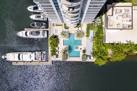 a front view of a building with garden