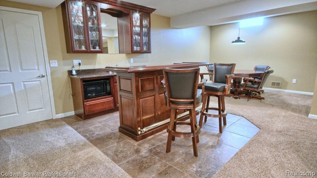 1992 Trinity Road Canton, MI 48187 - Photo 27 of 34 Finished_Lower_Level_Bar.jpg