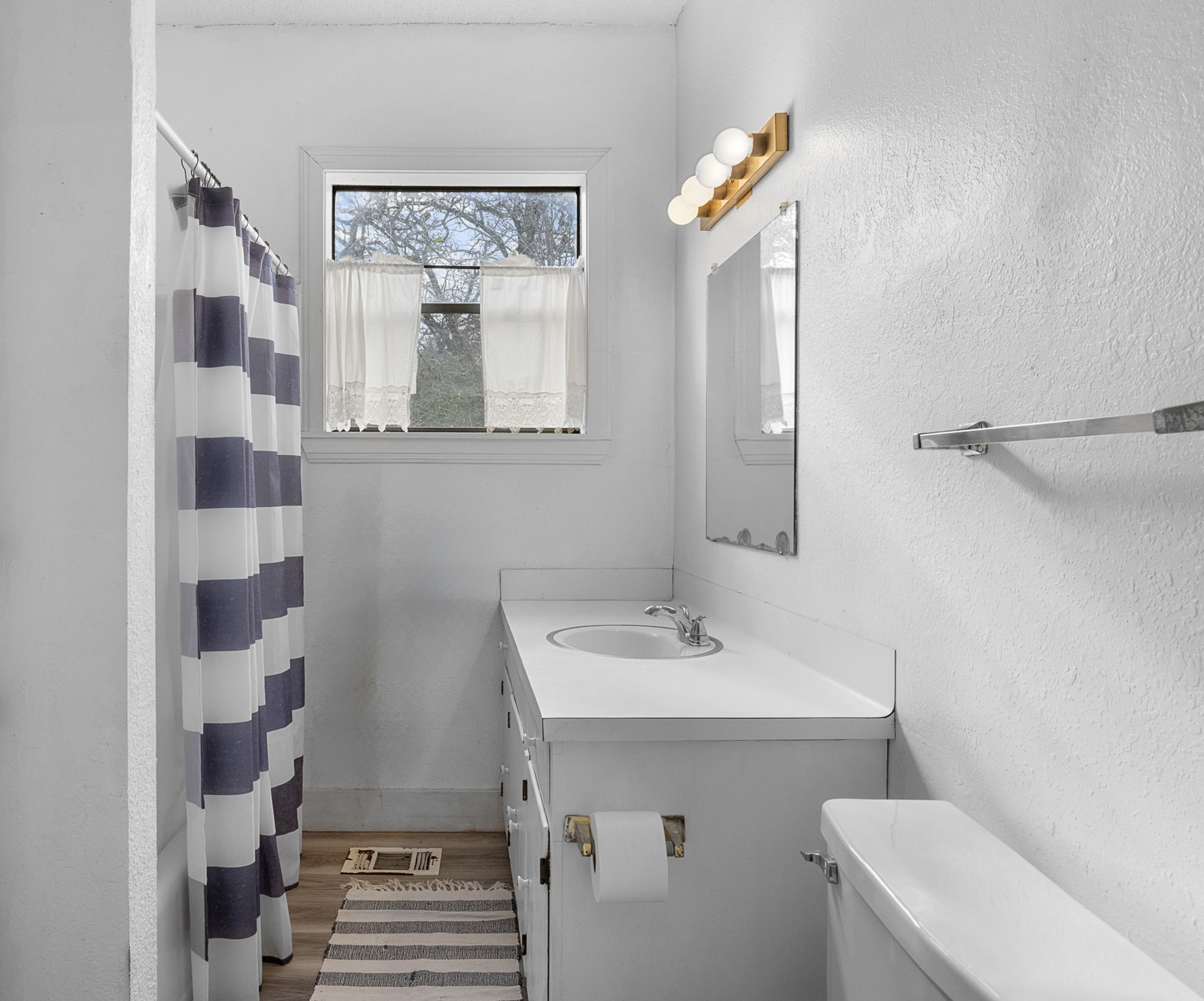 1139 Private Road 7009 Road Lexington, TX 78947 - Photo 16 of 32 a bathroom with a sink mirror and toilet