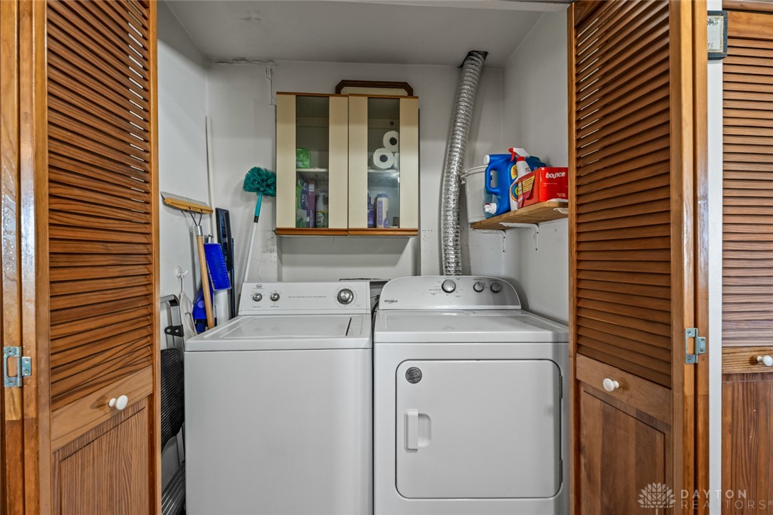 7404 Grubbs-Rex Road Arcanum, OH 45304 - Photo 22 of 40 This dedicated laundry space offers convenience and efficiency for daily chores.
