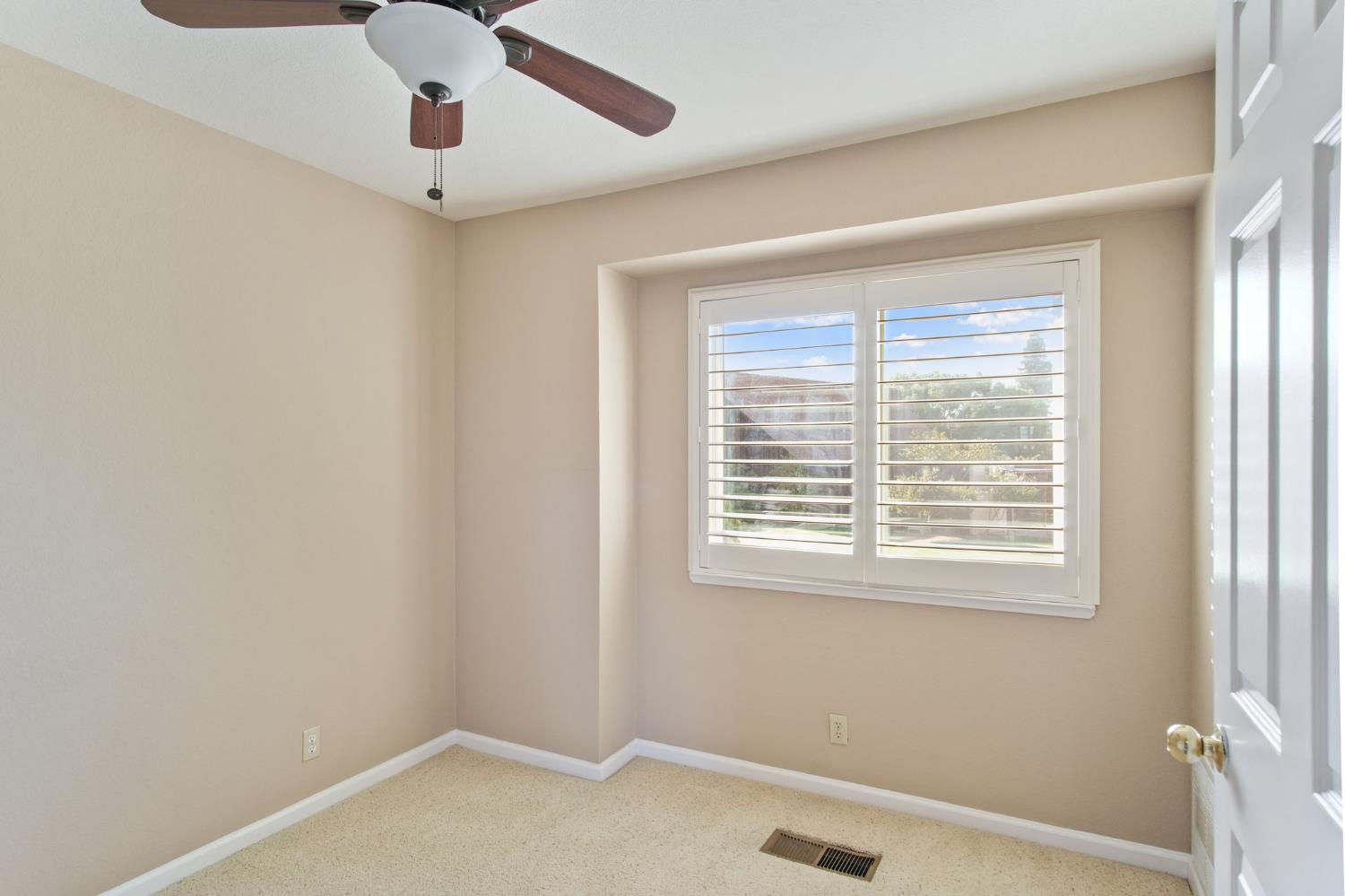 1345 Alex Circle Turlock, CA 95382 - Photo 19 of 35 a view of an empty room with a window